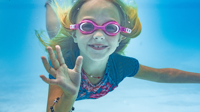 Girl swimming under water
