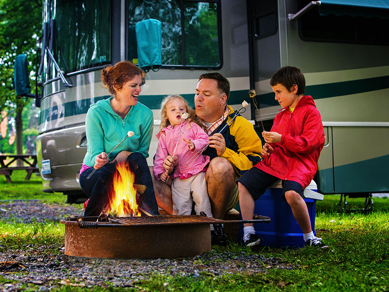 Family in front of cabin